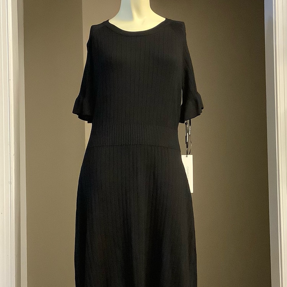 Calvin Klein Size M NWT
Black Sweater Dress Short Sleeve
Below Knee